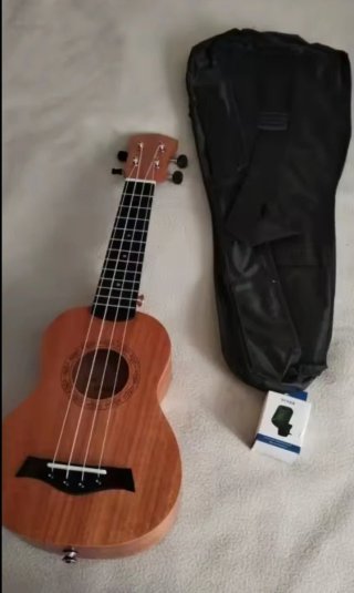 Ukelele madera caoba nuevo a estrenar