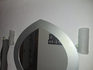 2 apliques de cristal y metal. 15 EUROS LOS DOS.