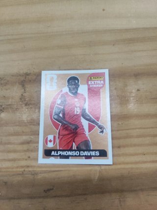 Carta Panini Extra Alphonso Davies bronce