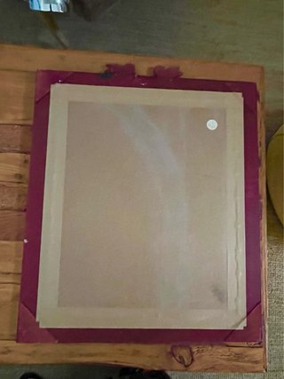 Espejo de pared con relieve de querubines