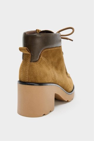 Botines Zara estilo mocasín tacón marrón