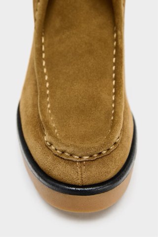 Botines Zara estilo mocasín tacón marrón