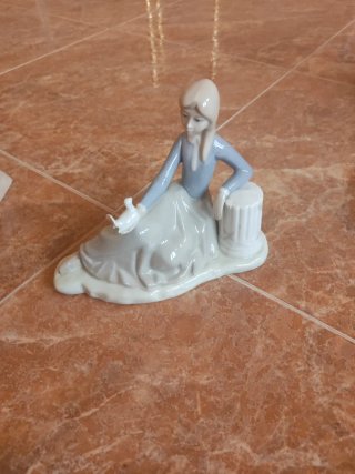 Figuras de porcelana mujer y hombre