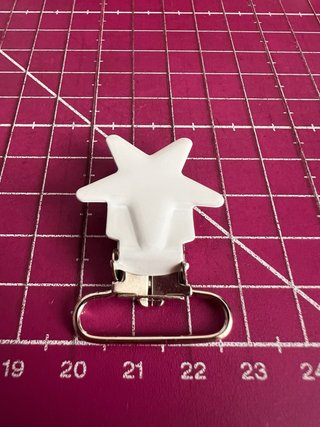 4 Pinzas para chupete estrella