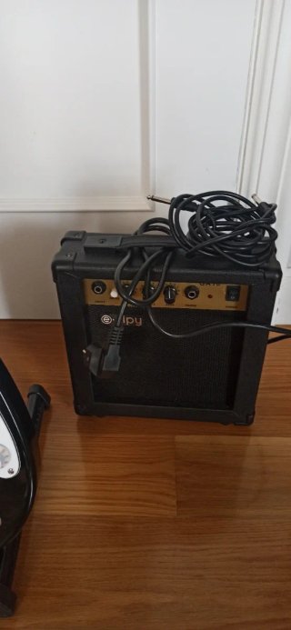 Guitarra Eléctrica Negra + Amplificador