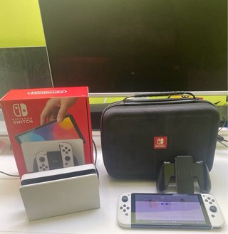 Nintendo Switch OLED + 8 giochi + Accessori