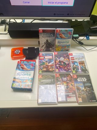 Nintendo Switch OLED + 8 giochi + Accessori