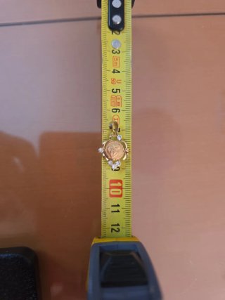 Medalla oro 18K con circonitas.