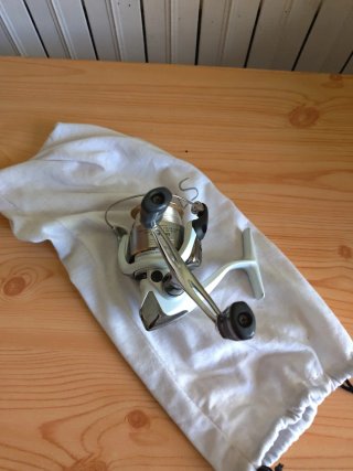 carrete de pesca Calcutta,Shimano stradic y daiwa