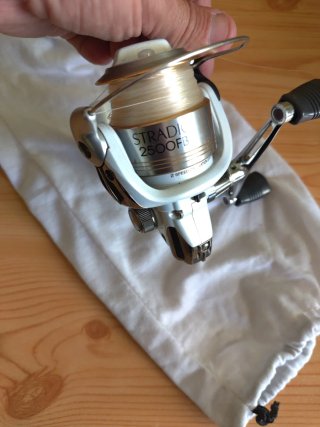 carrete de pesca Calcutta,Shimano stradic y daiwa