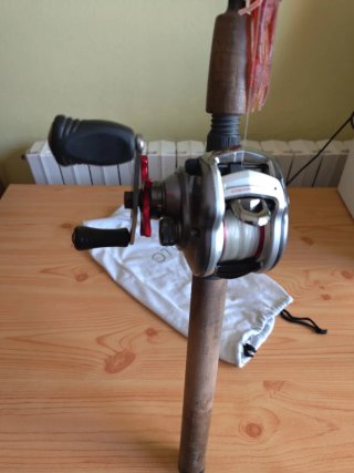 carrete de pesca Calcutta,Shimano stradic y daiwa