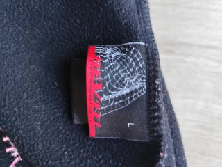 Braga cubre cuello marca Revit negra.