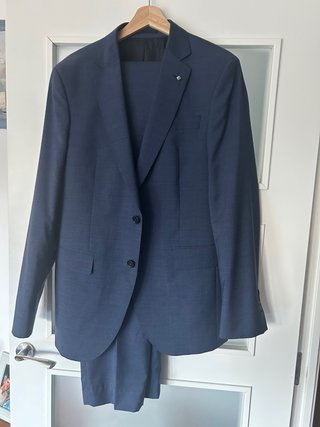 Traje Purificación García azul