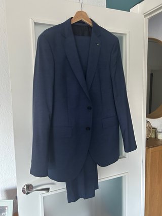 Traje Purificación García azul