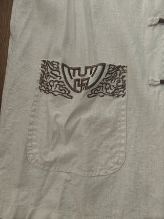 Chaqueta china beige bordada