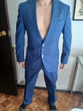 Traje de chaqueta y pantalón azul
