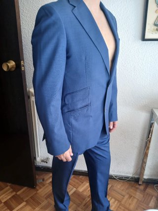Traje de chaqueta y pantalón azul