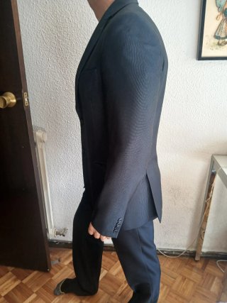Traje de chaqueta y pantalón azul