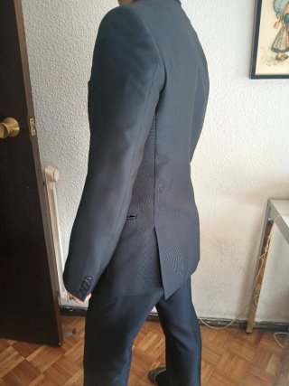 Traje de chaqueta y pantalón azul