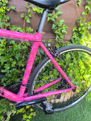 Bicicleta de carretera Orbea rosa