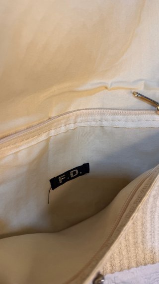 Bolso de paja con asa de cuero