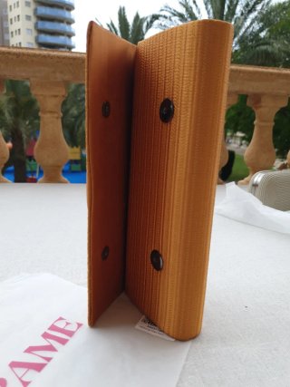 Cartera de mano seda color mostaza