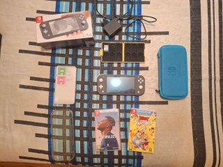 Nintendo Switch Lite + 3 Giochi + accessori