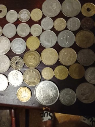 Lote de monedas antiguas negociable el precio