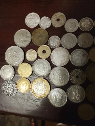 Lote de monedas antiguas negociable el precio