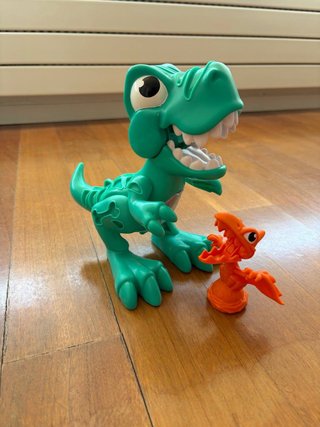 Play-Doh T-Rex y dinosaurio naranja