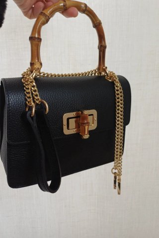 Borsa elegante nera con manico in bambù