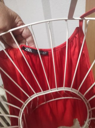 Blusa roja plisada