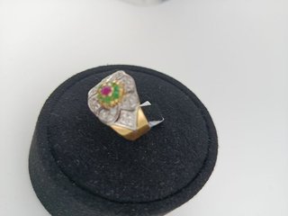 Anillo flor circonitas y rubí