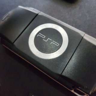 PSP 1000 Negra + UMD Pro Evolution Soccer 2008