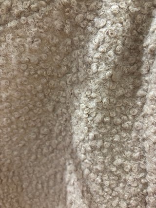 Cappotto beige in morbida pelliccia di agnello