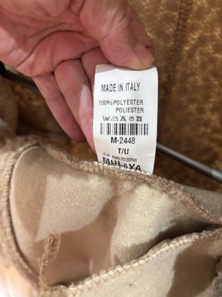 Cappotto beige in morbida pelliccia di agnello