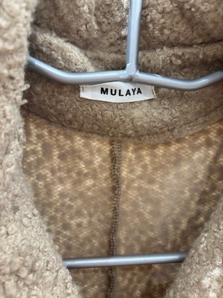 Cappotto beige in morbida pelliccia di agnello