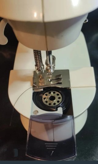Mini máquina de coser portátil eléctrica