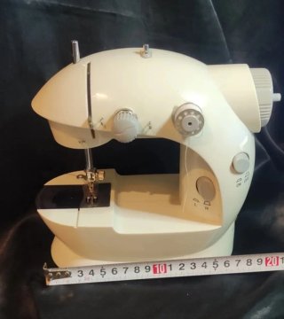 Mini máquina de coser portátil eléctrica