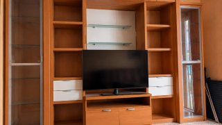 Mueble de salón madera y cristal