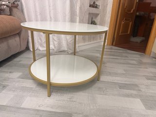 Mesa centro cristal y metal dorado