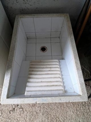 Pila de lavar de cemento