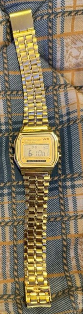 Reloj dorado mujer