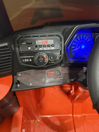 Coche eléctrico infantil naranja