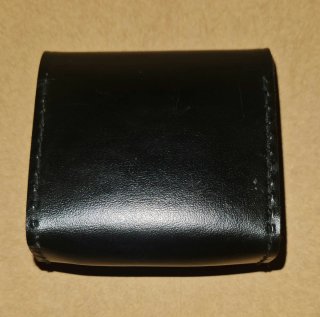 Estuche de piel negro para lentes de fotografía