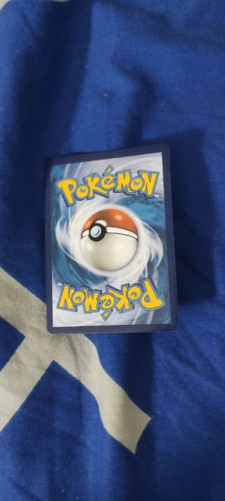 Carta Pokémon Eevee & Snorlax GX TAG TEAM