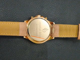 Reloj Crystal Blue dorado y beige con pedrería