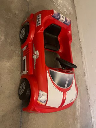 Cochecito rojo para niños