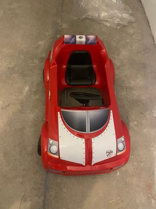 Cochecito rojo para niños