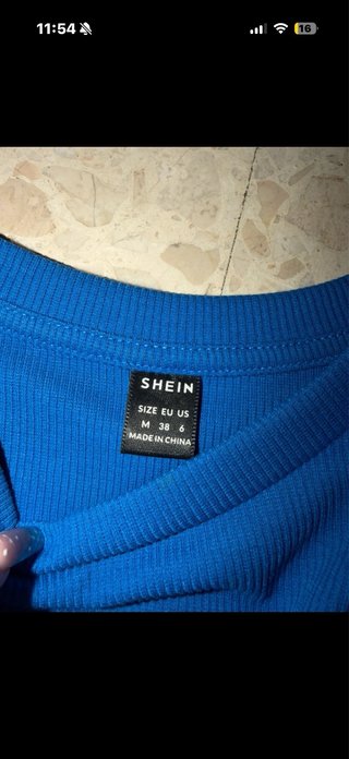 Top manga larga azul con cordones